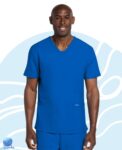 Chaqueta de uniforme médico para caballero Cherokee modelo CK784A azul eléctrico. Vista frontal.