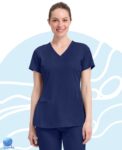 Chaqueta de uniforme médico para dama Healing Hands modelo 2500 azul marino. Vista frontal.